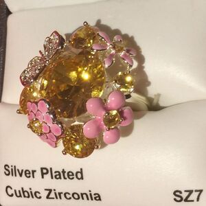 Silver plated cubic zirconia ring.